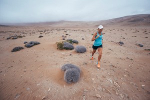 Mina Guli running in Chile's Atacama Desert